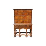 A Queen Anne and later walnut chest on stand