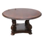A continental mahogany circular centre table