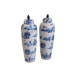 A pair of large Chinese blue and white porcelain jars and covers.