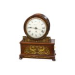 A Victorian rosewood and brass inlaid mantel clock