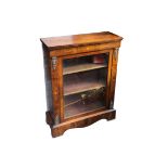 A Victorian walnut and ormolu mounted pier cabinet