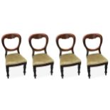 A set of four Victorian mahogany balloon back dining chairs