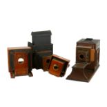 A Collection of Mahogany & Brass Cameras, Accessories and Enlargers