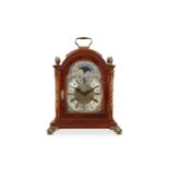 A George III style mahogany and brass mounted table / bracket clock with moonphase