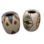 Two decorative African painted wooden vases