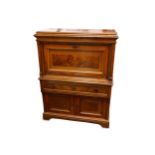 An early 20th Century Continental walnut cabinet