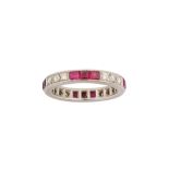 A ruby and diamond eternity ring