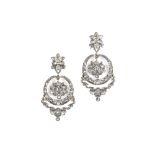 A pair of diamond pendent earrings