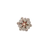 A late 19th century ruby and diamond flower brooch