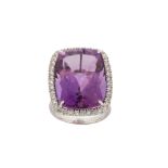 An amethyst and diamond cluster ring