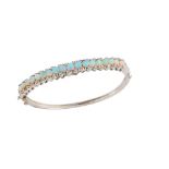 An opal and diamond bangle