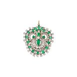 An emerald and diamond brooch / pendant