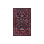 AN ANTIQUE BIJAR RUG, NORTH-WEST PERSIA