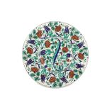 A LARGE IZNIK-STYLE POTTERY SERVING PLATE