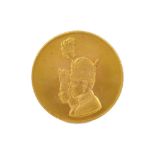 A MOHAMMAD REZA SHAH PAHLAVI CORONATION COMMEMORATIVE GOLD COIN