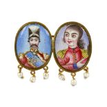 *A BROOCH WITH PAINTED ENAMEL PORTRAITS