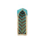 A TURQUOISE AND BROWN-PAINTED CUERDA SECA POTTERY NICHE TILE (MUQARNAS)