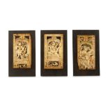 THREE CARVED IVORY PLAQUES WITH EROTIC SCENES