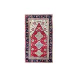 AN ANTIQUE TUDUC PRAYER RUG, TRANSILVANIA