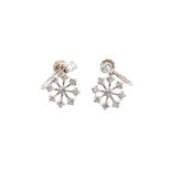 A pair of diamond snowflake earrings