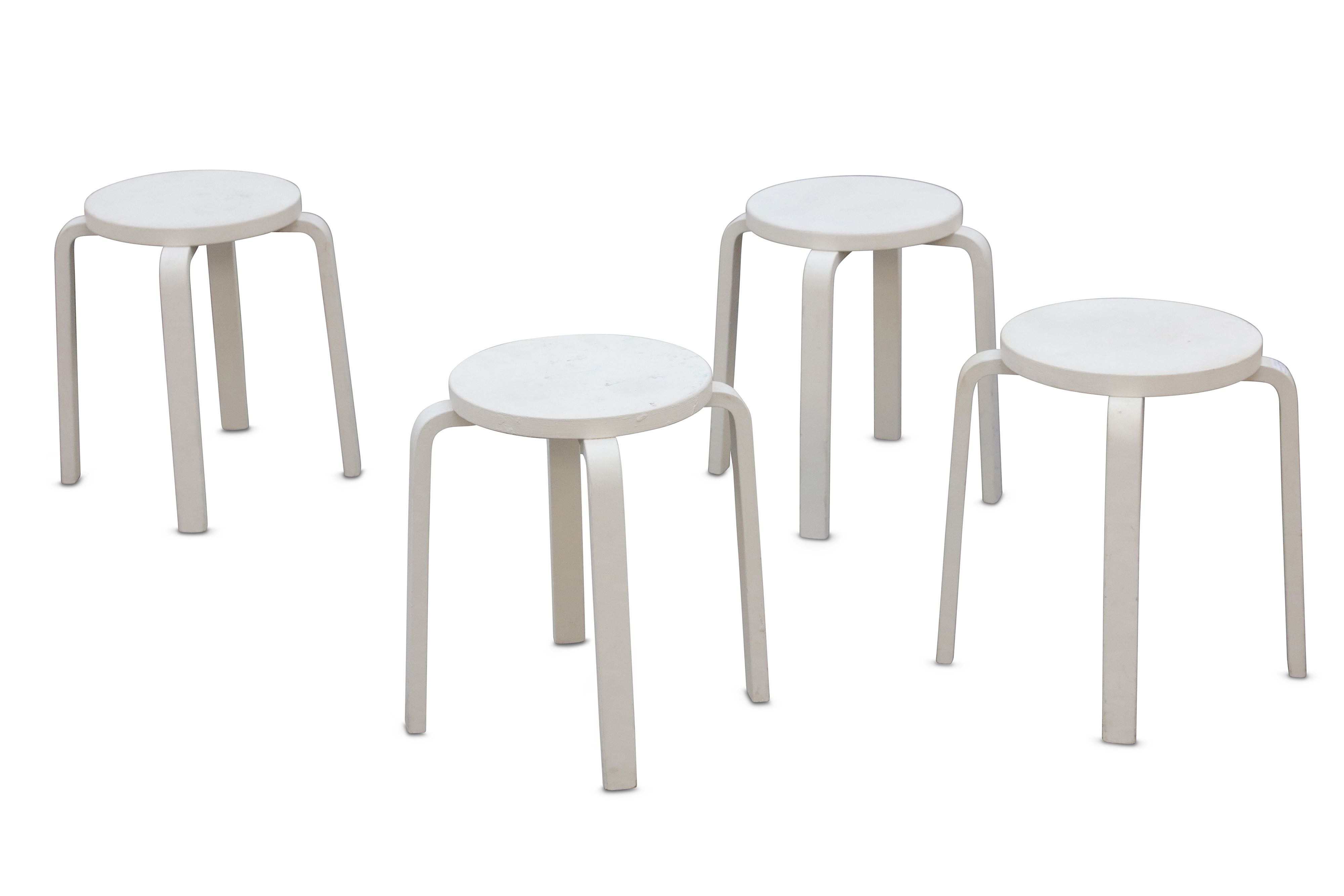 ALVAR AALTO: Four L-legged stools, designed 1930s for Artek