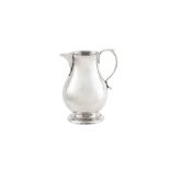 A George II sterling silver ‘sparrow beak’ cream jug, London 1729 by CH, probably for Charles Hatfie