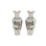 A pair of early 20th century Chinese export silver vases, probably Shanghai circa 1900-1920