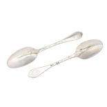A pair of Queen Anne Britannia standard silver dognose table spoons, London 1705/06 by Henry Green (