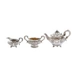 An assembled George IV – Victorian Irish sterling silver three-piece tea service, the teapot Dublin