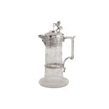 A mid-Victorian sterling silver mounted claret jug, Birmingham 1865 by Elkington & Co