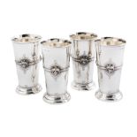 A set of four Edwardian sterling silver beakers, London 1909 by Daniel and John Welby