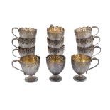 A set of twelve late 19th / early 20th century French 950 standard silver Turkish coffee glass holde