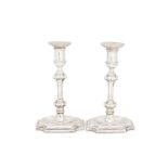 A pair of Edwardian sterling silver candlesticks, London 1906 by Hawksworth, Eyre & Co Ltd