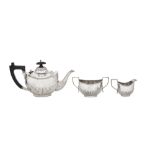 A George V sterling silver bachelor tea set, Birmingham 1914 by Henry Mathews