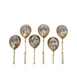 A set of six Alexander II Russian 84 zolotnik (875 standard) silver gilt and niello spoons, Moscow 1