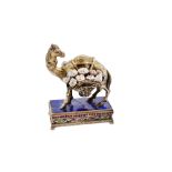An early 20th century continental silver gilt, enamel, lapis lazuli and baroque pearl model of a cam