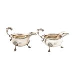 A pair of Edwardian sterling silver sauceboats, Chester 1902 by Nathan & Hayes