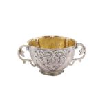 An early 18th century continental unmarked silver caudle cup, probably German circa 1700