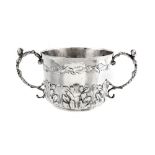 A Charles II sterling silver twin handled porringer, London 1680 by RH, crowned, crescent below (uni