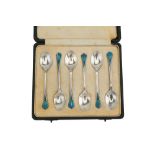 A cased set of six George VI sterling silver and enamel coffee demitasse spoons, Birmingham 1937 by