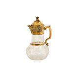 A Victorian sterling silver gilt mounted glass claret jug, London 1865 by John Figg
