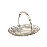 An Edwardian sterling silver bread basket, Sheffield 1906 by Martin, Hall & Co