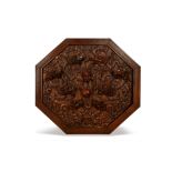 A CHINESE OCTAGONAL HONGMU 'NINE DRAGONS' PLAQUE.