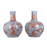 A PAIR OF CHINESE IRON-RED AND BLUE AND WHITE ‘DRAGON’ VASES, TIANQIUPING.