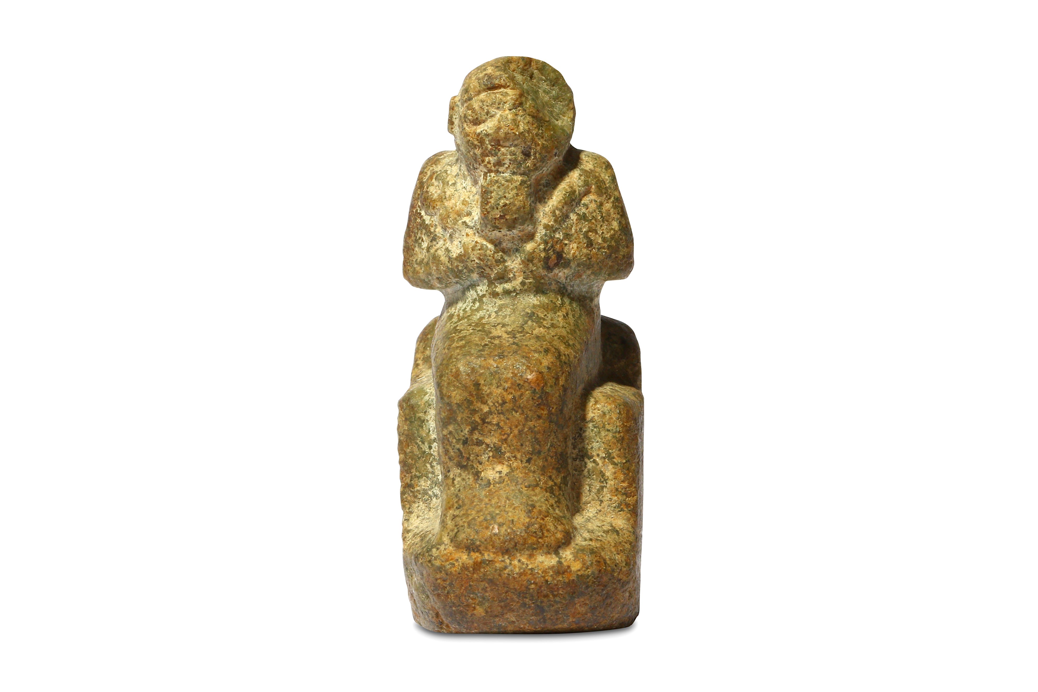 AN EGYPTIAN FELDSPAR SEATED PTAH