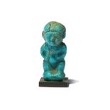 AN EGYPTIAN GLAZED COMPOSITION PATAIKOS AMULET