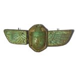 AN EGYPTIAN GLAZED COMPOSITION WINGED SCARAB