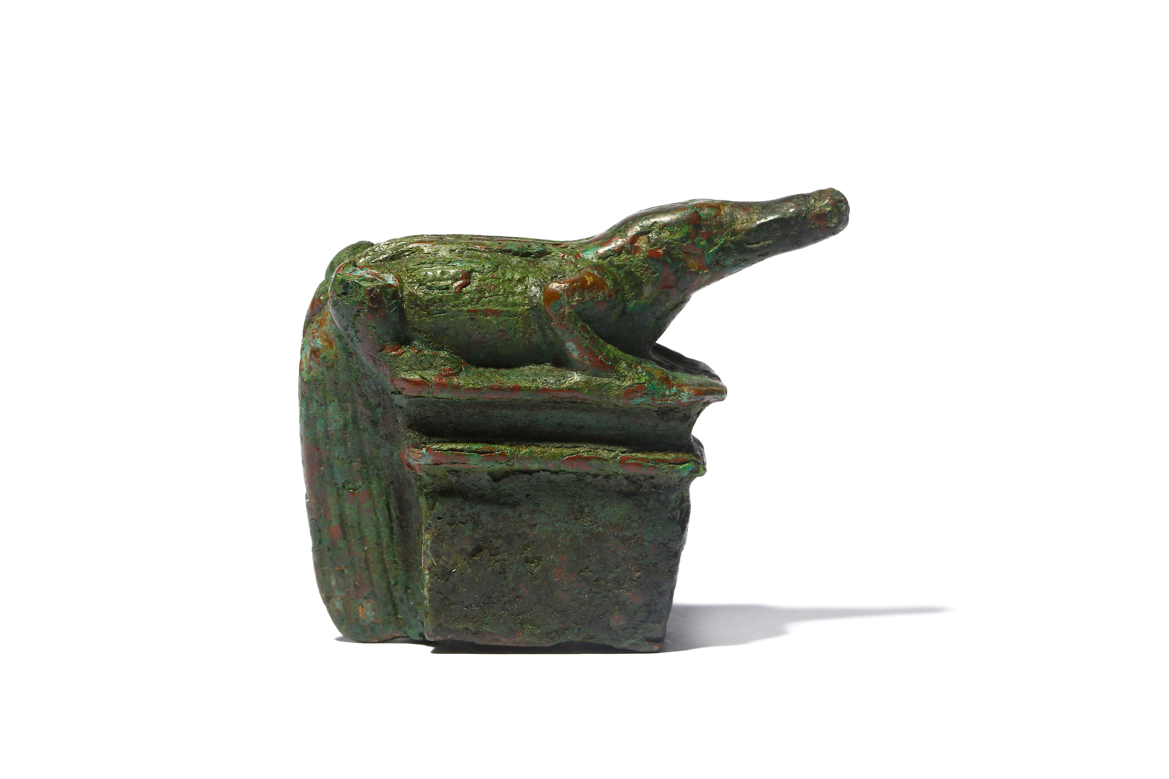 AN EGYPTIAN BRONZE CROCODILE