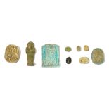A GROUP OF EGYPTIAN SCARABS AND AMULETS
