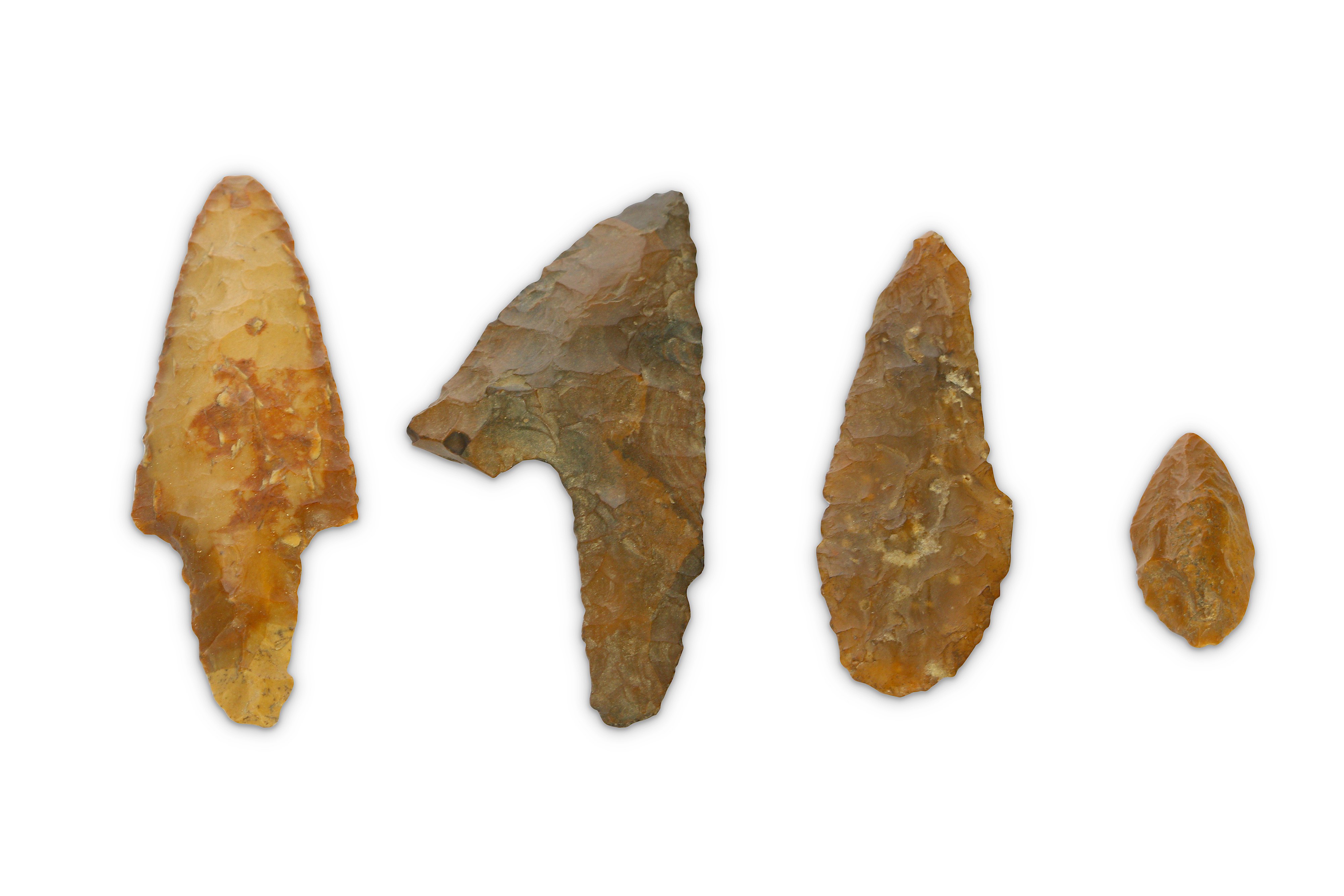 A GROUP OF EGYPTIAN PRE-DYNASTIC FLINT ARROW HEADS